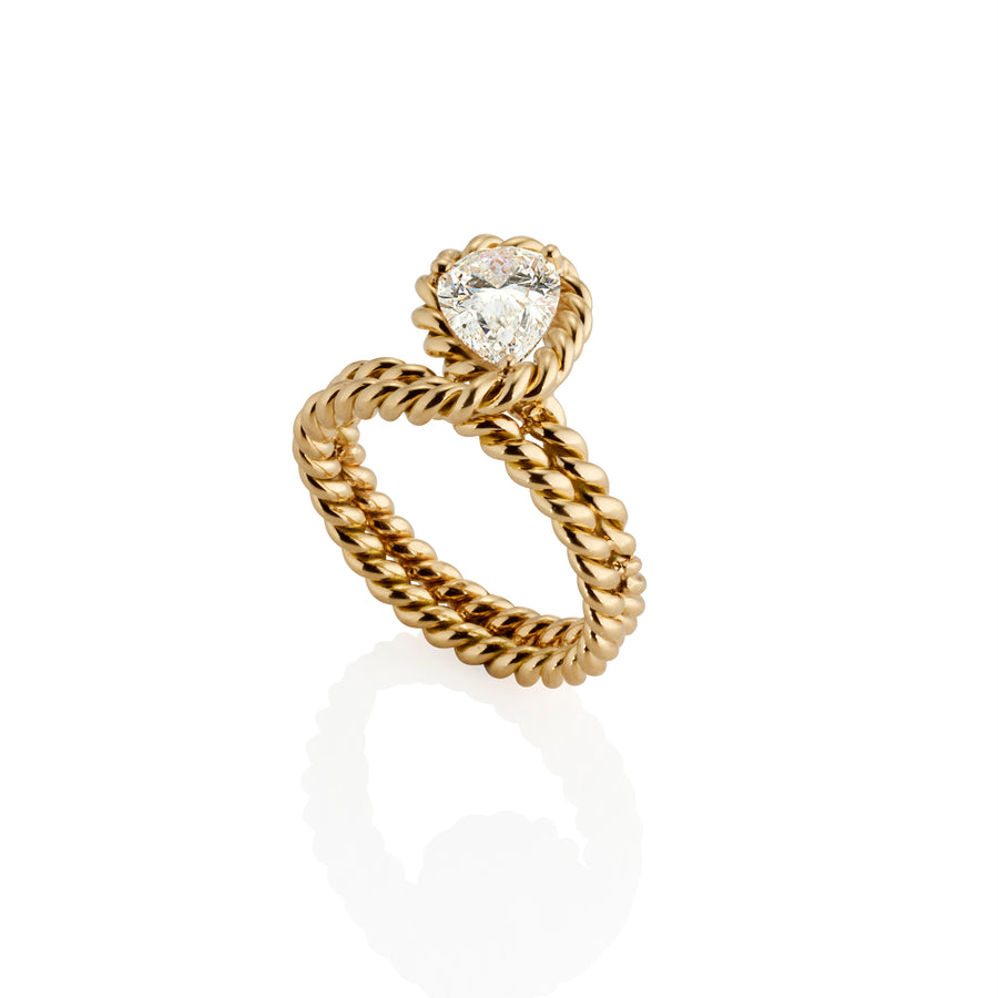 Double Twist Ring with Pear Shaped Diamond